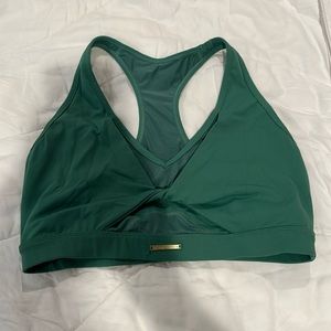 Gymshark x Whitney Simmons Volume 4 Collection: Mesh Sports Bra in Palm Green.